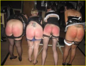 Sub French maids line up for discipline at London spanking party