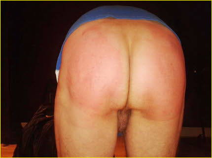 Sub male with bum in the air at British Spanking Party