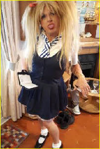 Mature transvestite schoolgirl spankee cheekily sticks out tongue